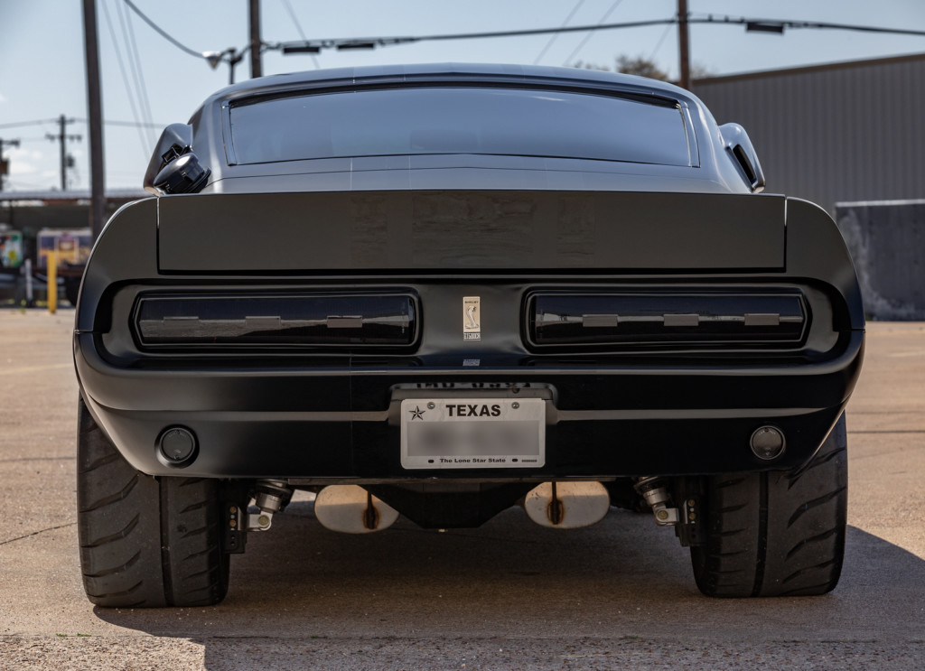 1967 Shelby GT500CR 900S flat black with black stripes built by Classic Recreations rear view